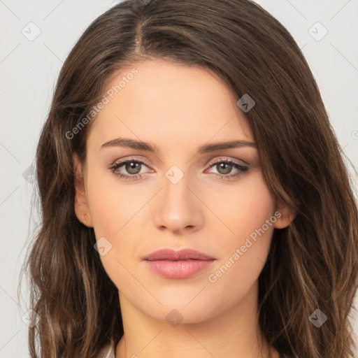 Neutral white young-adult female with long  brown hair and brown eyes