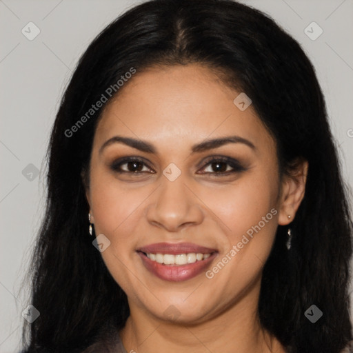 Joyful latino young-adult female with long  brown hair and brown eyes