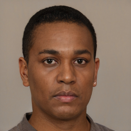 Neutral black young-adult male with short  brown hair and brown eyes