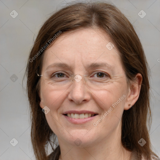 Joyful white adult female with medium  brown hair and grey eyes