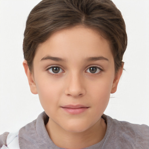 Joyful white child female with short  brown hair and brown eyes