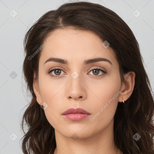 Neutral white young-adult female with long  brown hair and brown eyes