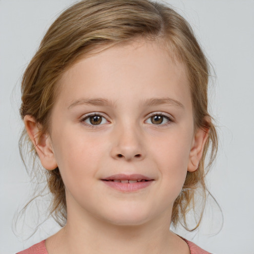 Joyful white child female with medium  brown hair and brown eyes