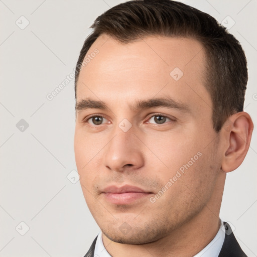 Neutral white young-adult male with short  brown hair and brown eyes