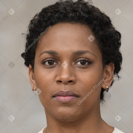 Neutral black young-adult female with short  brown hair and brown eyes