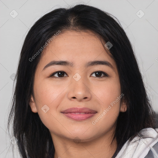 Joyful asian young-adult female with long  brown hair and brown eyes