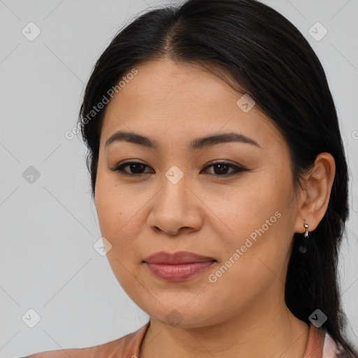 Joyful asian young-adult female with medium  brown hair and brown eyes