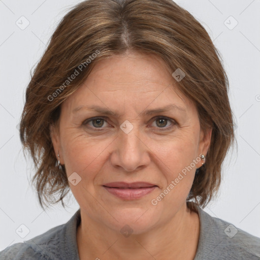 Joyful white adult female with medium  brown hair and grey eyes