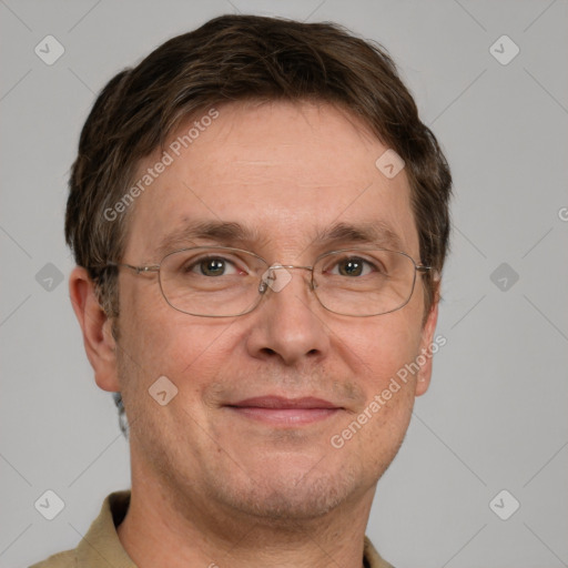 Joyful white adult male with short  brown hair and grey eyes