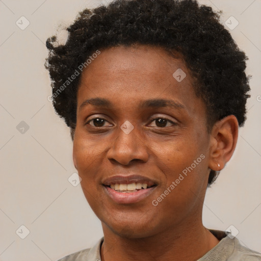 Joyful black young-adult female with short  brown hair and brown eyes