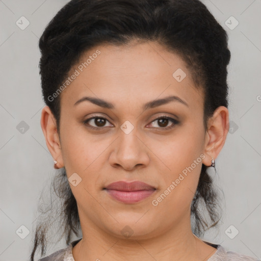 Joyful latino young-adult female with short  brown hair and brown eyes