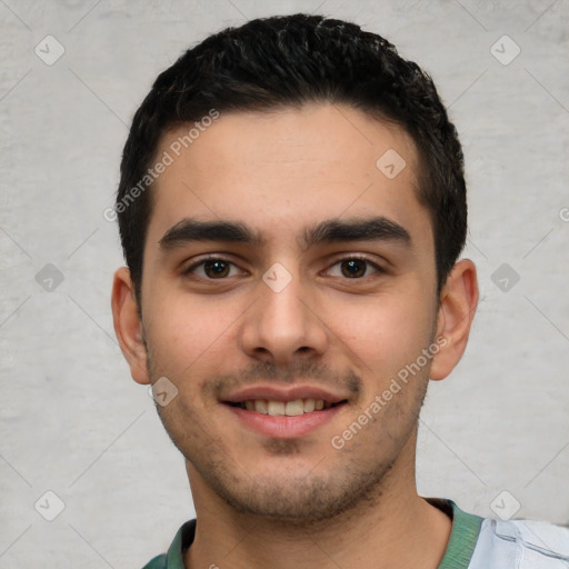 Joyful white young-adult male with short  black hair and brown eyes