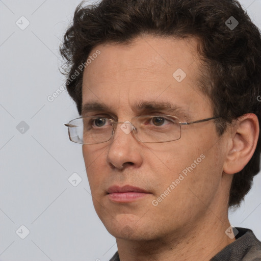 Neutral white adult male with short  brown hair and brown eyes
