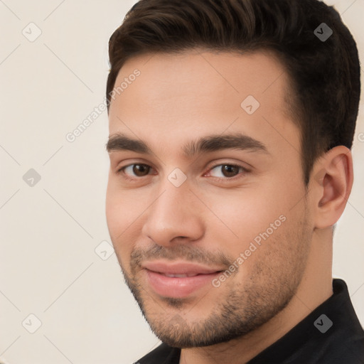 Joyful white young-adult male with short  brown hair and brown eyes