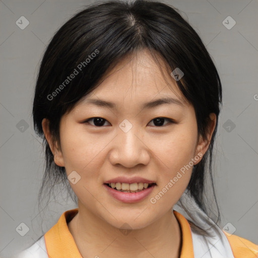 Joyful asian young-adult female with medium  brown hair and brown eyes