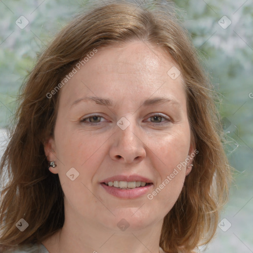 Joyful white adult female with medium  brown hair and grey eyes