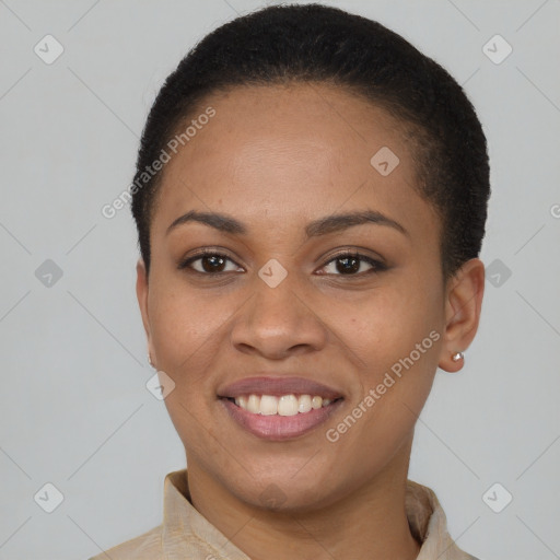 Joyful black young-adult female with short  brown hair and brown eyes