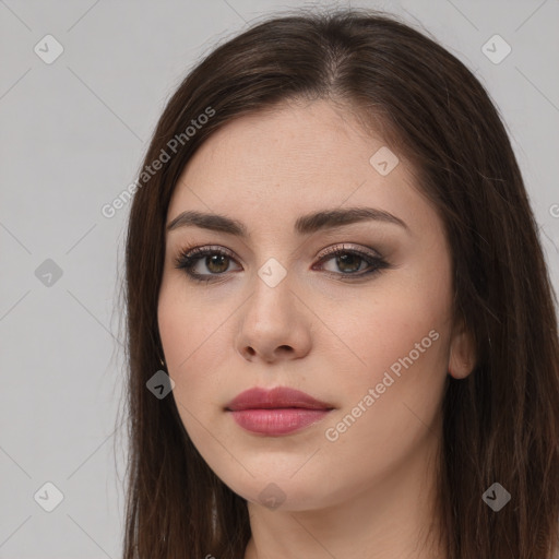 Neutral white young-adult female with long  brown hair and brown eyes