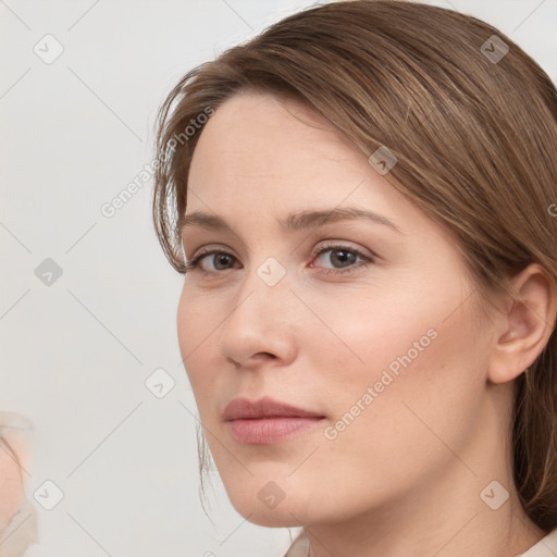 Neutral white young-adult female with medium  brown hair and brown eyes