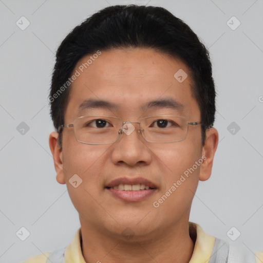 Joyful asian young-adult male with short  brown hair and brown eyes