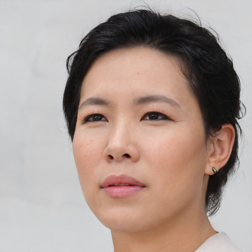 Neutral asian young-adult female with short  black hair and brown eyes