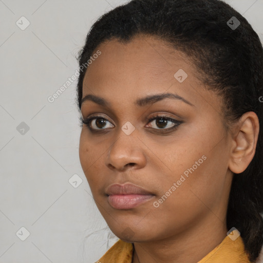 Neutral black young-adult female with short  brown hair and brown eyes