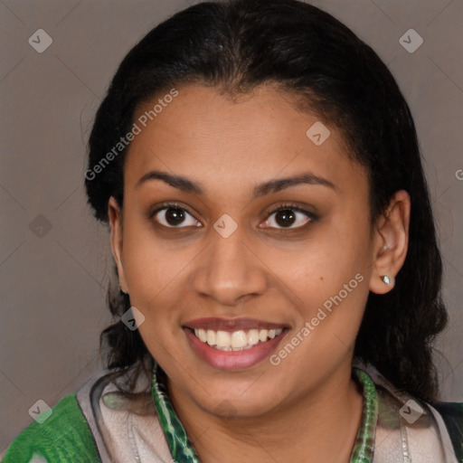 Joyful latino young-adult female with short  brown hair and brown eyes