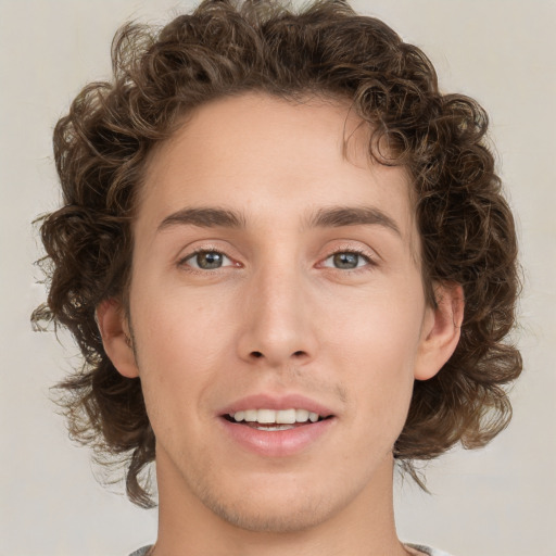 Joyful white young-adult female with medium  brown hair and green eyes