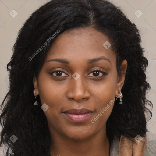 Joyful black young-adult female with long  black hair and brown eyes