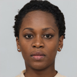 Neutral black young-adult female with short  black hair and brown eyes