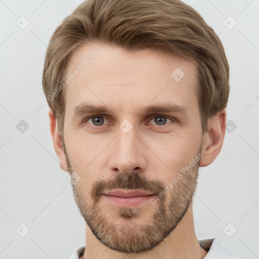 Neutral white young-adult male with short  brown hair and grey eyes