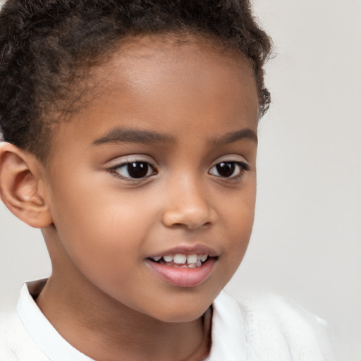 Joyful white child female with short  brown hair and brown eyes