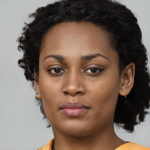 Neutral black young-adult female with long  black hair and brown eyes