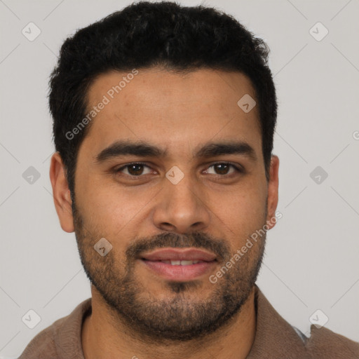 Joyful latino young-adult male with short  black hair and brown eyes