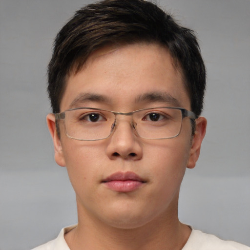 Neutral asian young-adult male with short  brown hair and brown eyes