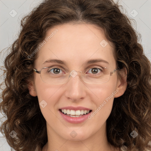 Joyful white young-adult female with long  brown hair and green eyes