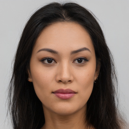 Neutral latino young-adult female with long  brown hair and brown eyes