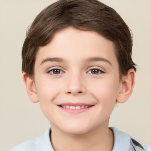 Joyful white child female with short  brown hair and brown eyes