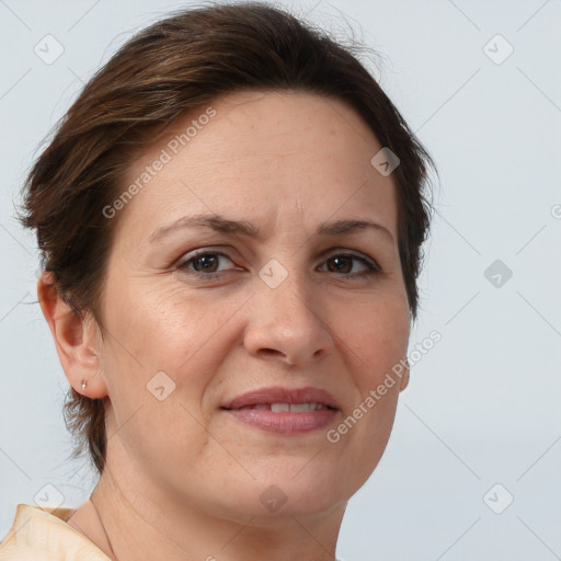 Joyful white adult female with short  brown hair and brown eyes