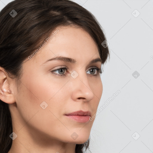 Neutral white young-adult female with medium  brown hair and brown eyes