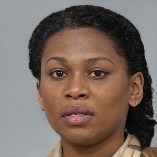 Neutral black young-adult female with short  brown hair and brown eyes