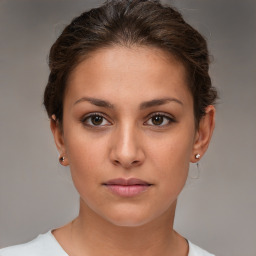 Neutral white young-adult female with short  brown hair and brown eyes