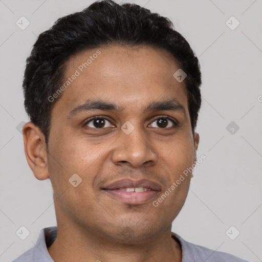 Joyful latino young-adult male with short  black hair and brown eyes