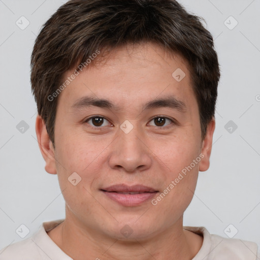 Joyful white young-adult male with short  brown hair and brown eyes