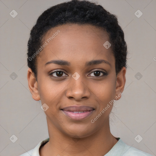 Joyful black young-adult female with short  brown hair and brown eyes