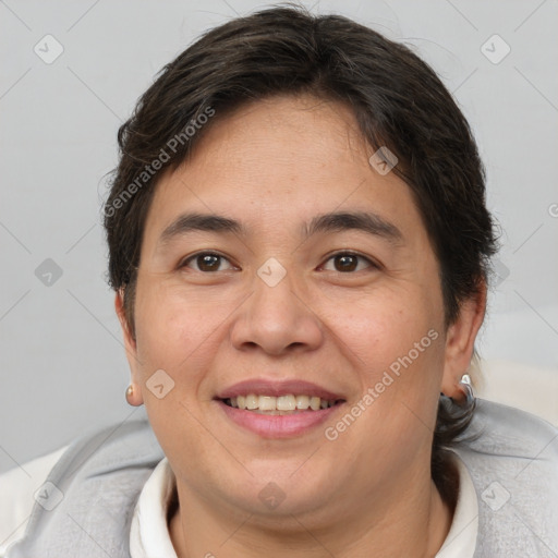 Joyful white adult female with short  brown hair and brown eyes