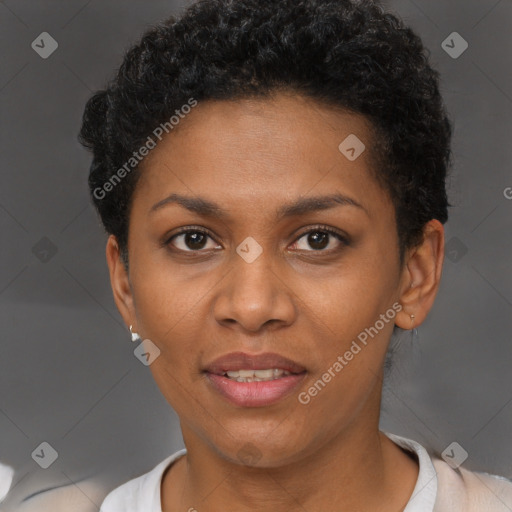 Joyful black young-adult female with short  brown hair and brown eyes