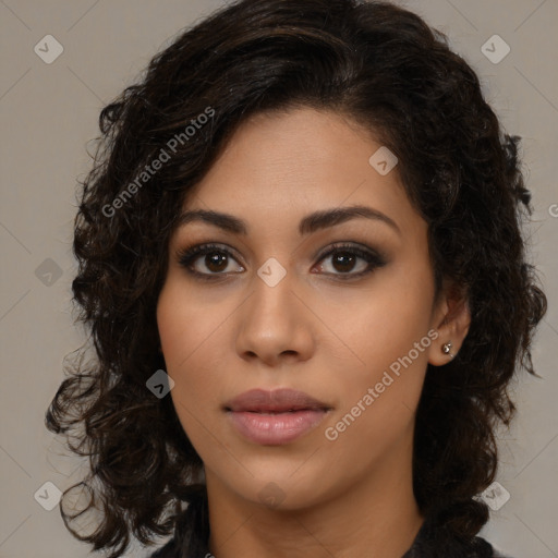 Joyful latino young-adult female with long  brown hair and brown eyes