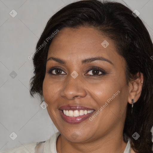 Joyful white adult female with medium  brown hair and brown eyes