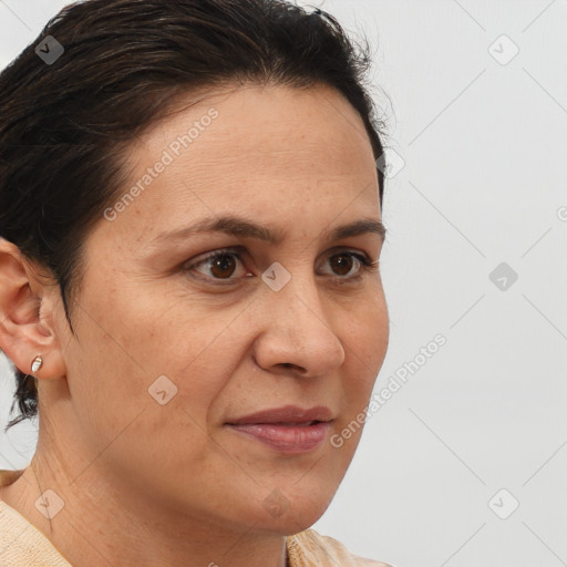 Joyful white adult female with short  brown hair and brown eyes